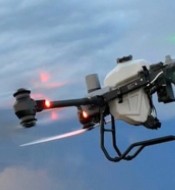 Agricultural spray drone in flight